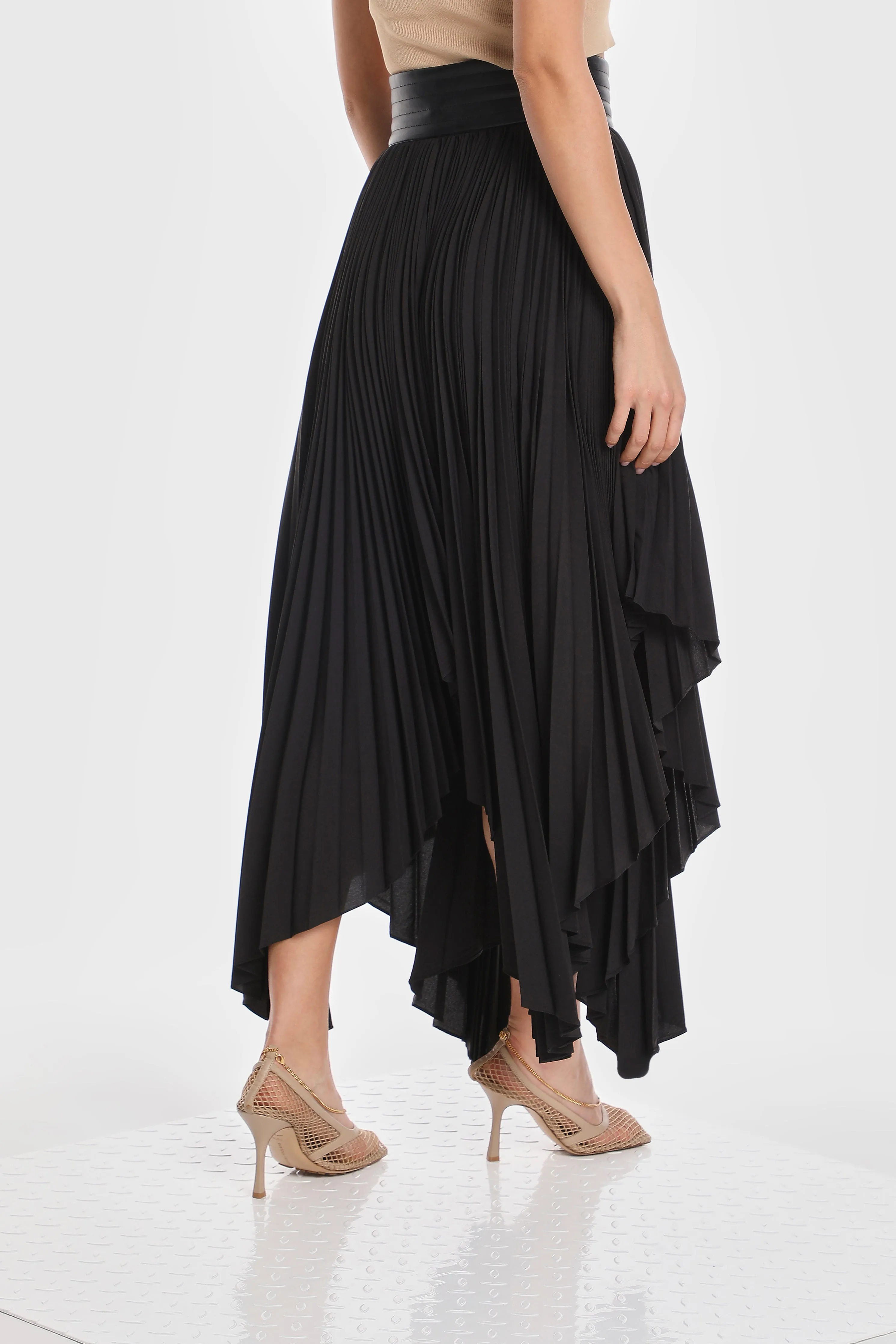 ASYMMETRIC PLEATED SKIRT W/ VEGAN LEATHER WAIST