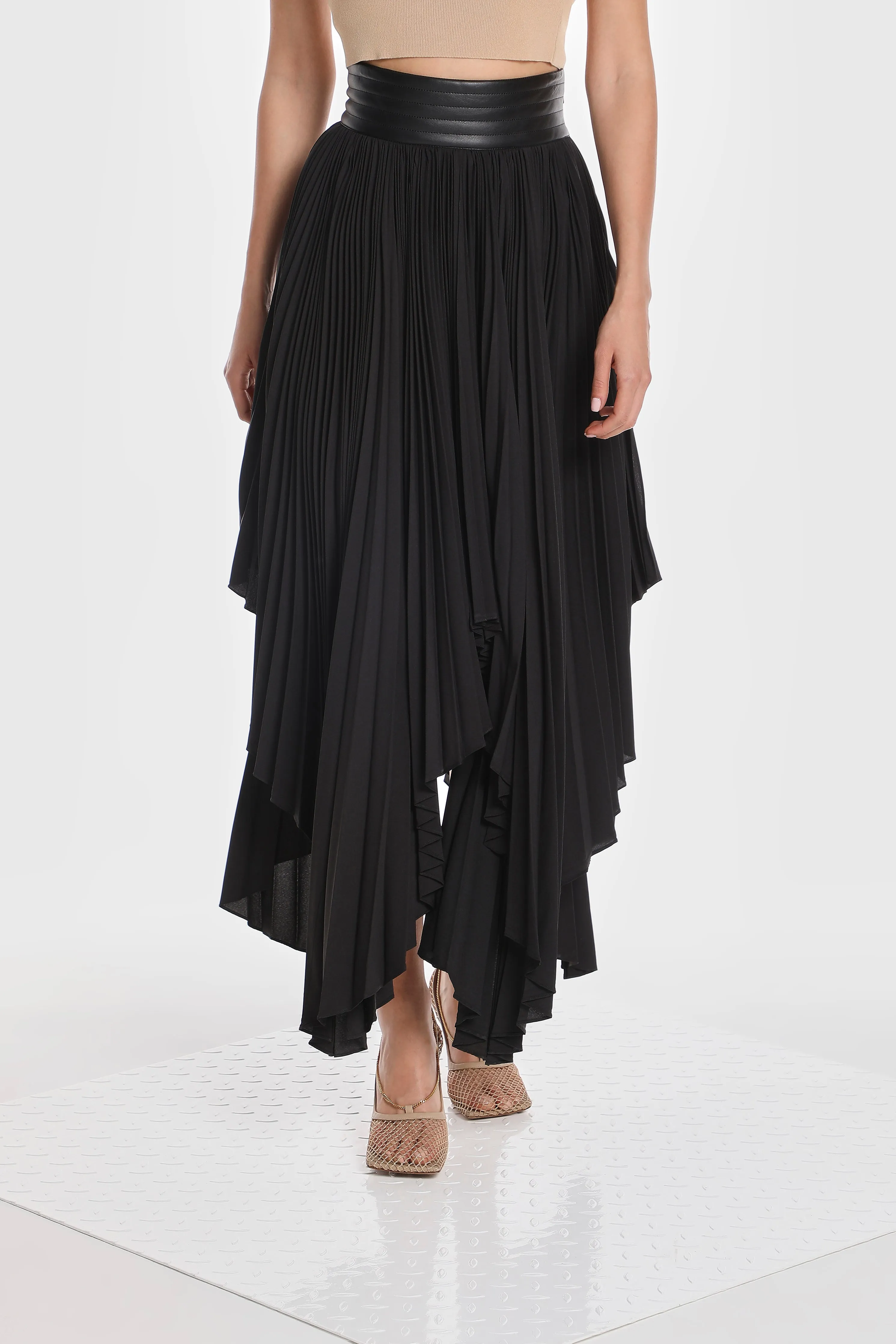 ASYMMETRIC PLEATED SKIRT W/ VEGAN LEATHER WAIST