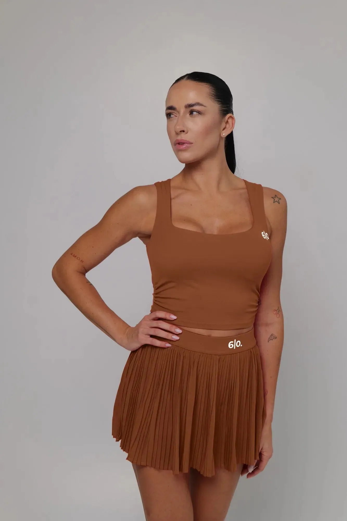 Brown color top and pleated skirt set