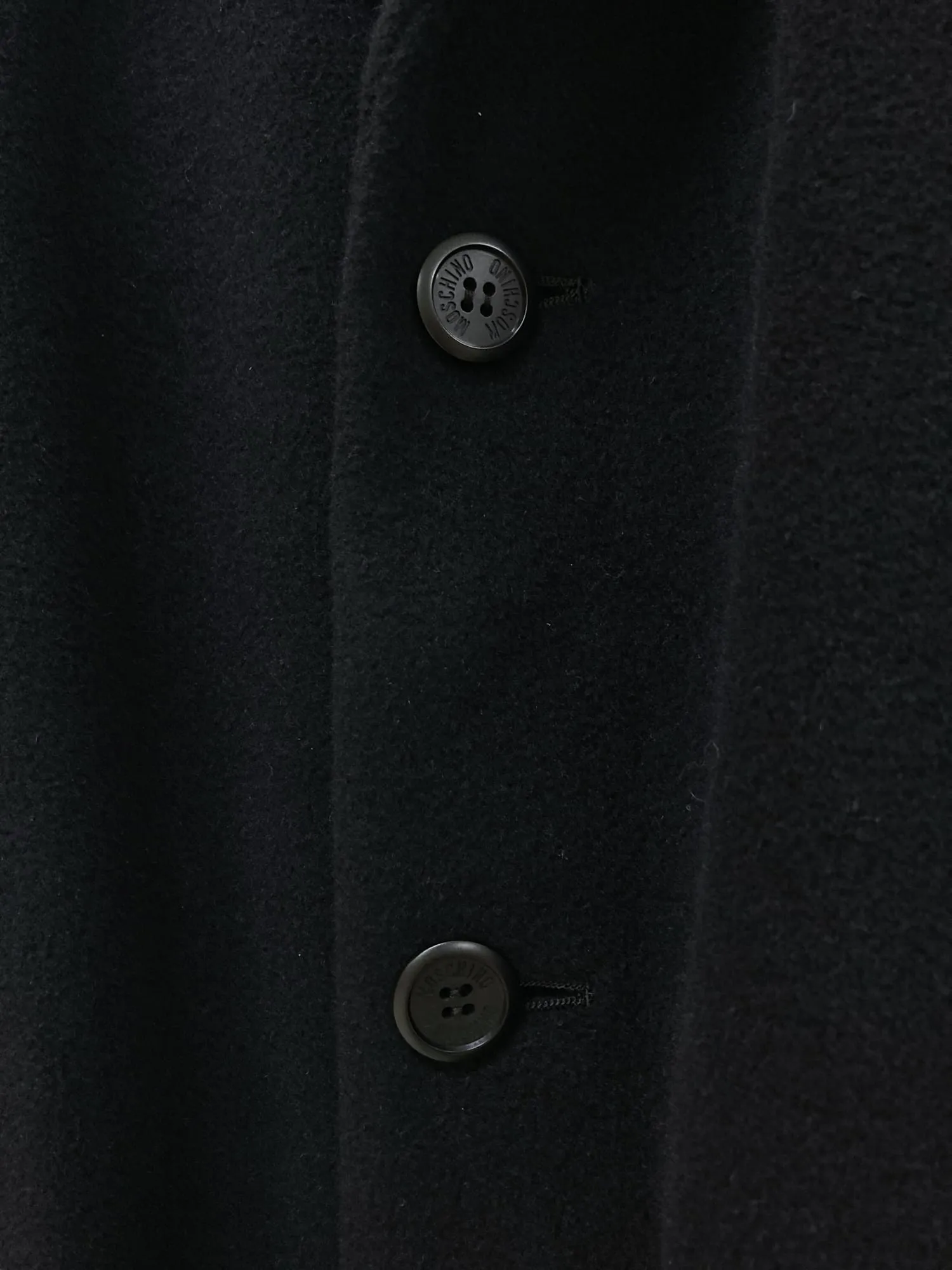 Moschino Normal But Formal 1990s black wool melton four button overcoat - L M